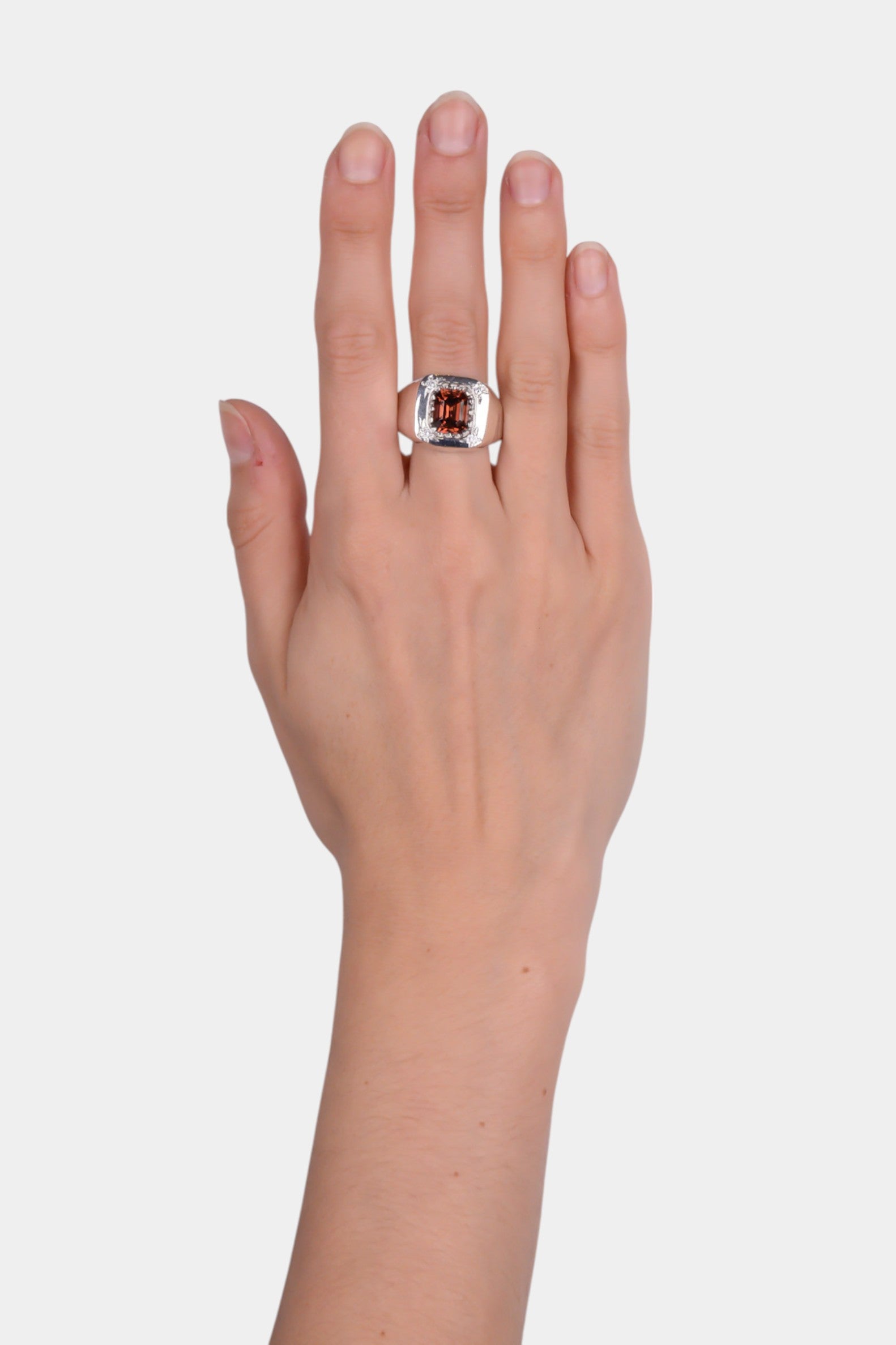 Hunkaspunk Ring wearing on hand
solid sterling silver 
~ 6ct emerald cut brown zircon
~ four 2mm round white CZs