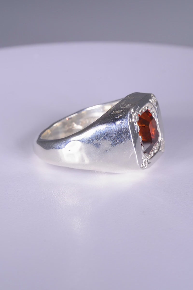 Hunkaspunk Ring
solid sterling silver 
~ 6ct emerald cut brown zircon
~ four 2mm round white CZs