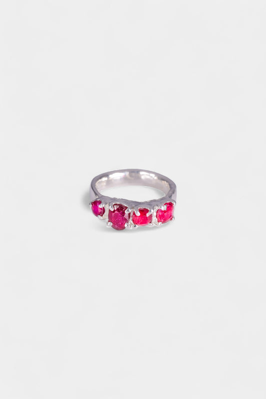 Sangria Ring
solid sterling silver 
~ 6.5x5mm oval cut ruby
~ 4.5mm cushion cut ruby
~ 5.5mm cushion cut ruby
~ 4mm round cut ruby